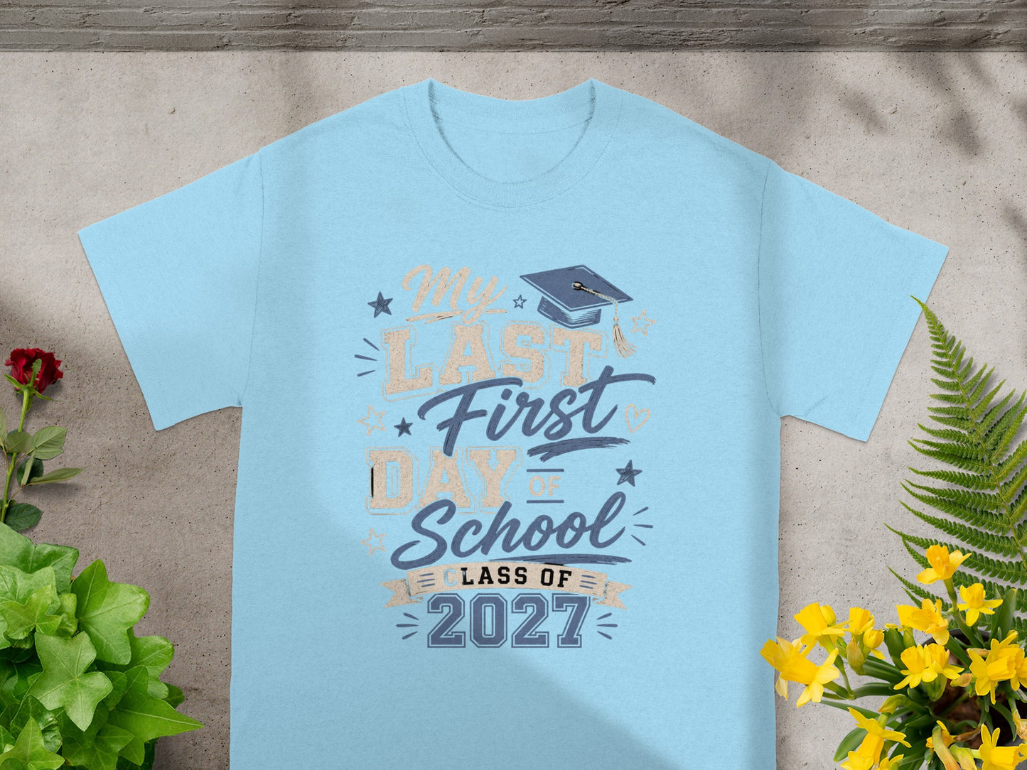 Light blue t-shirt with "My Last First Day of School Class of 2027" graphic.