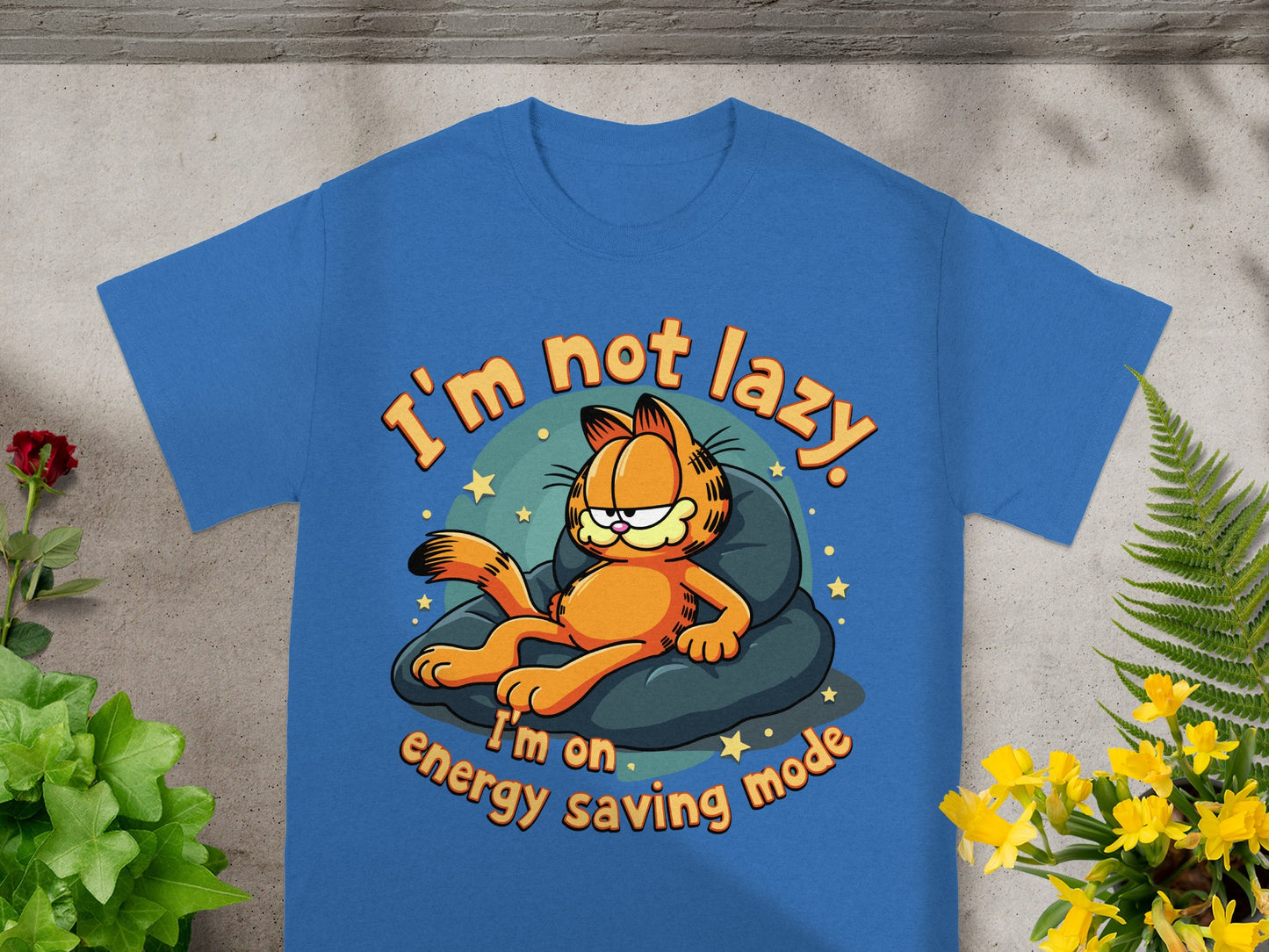 Blue t-shirt with Garfield lying down and text that says "I'm not lazy. I'm on energy saving mode."