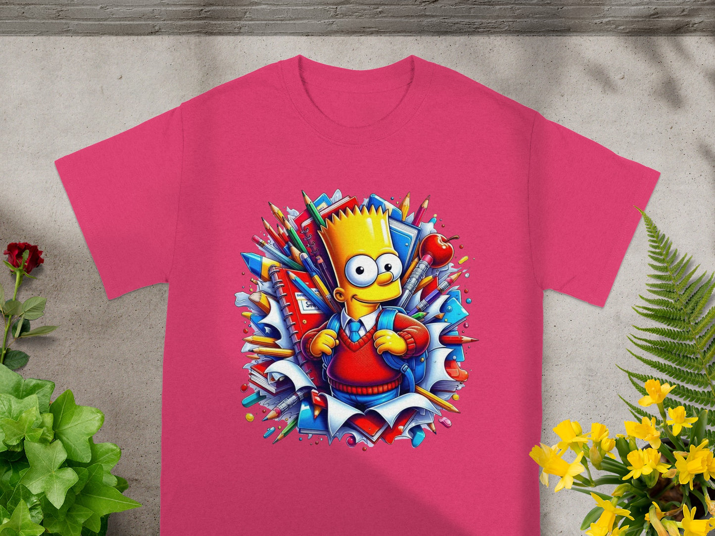 Pink t-shirt featuring Bart Simpson surrounded by school supplies and books.