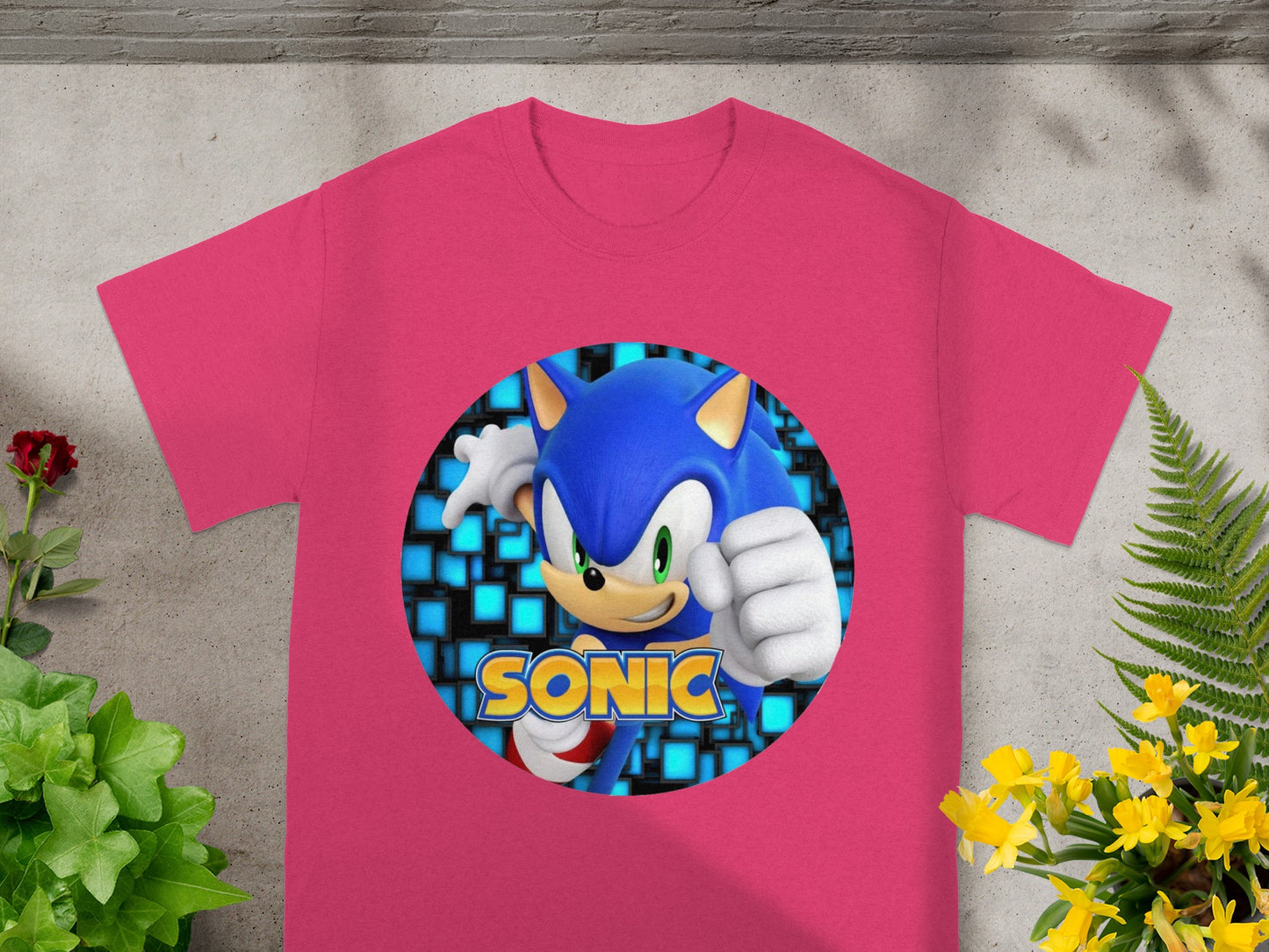 Pink t-shirt with Sonic the Hedgehog graphic and "SONIC" text.