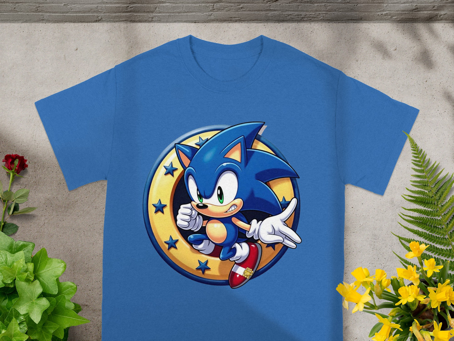 Sonic the Hedgehog character art with stars on a blue t-shirt.