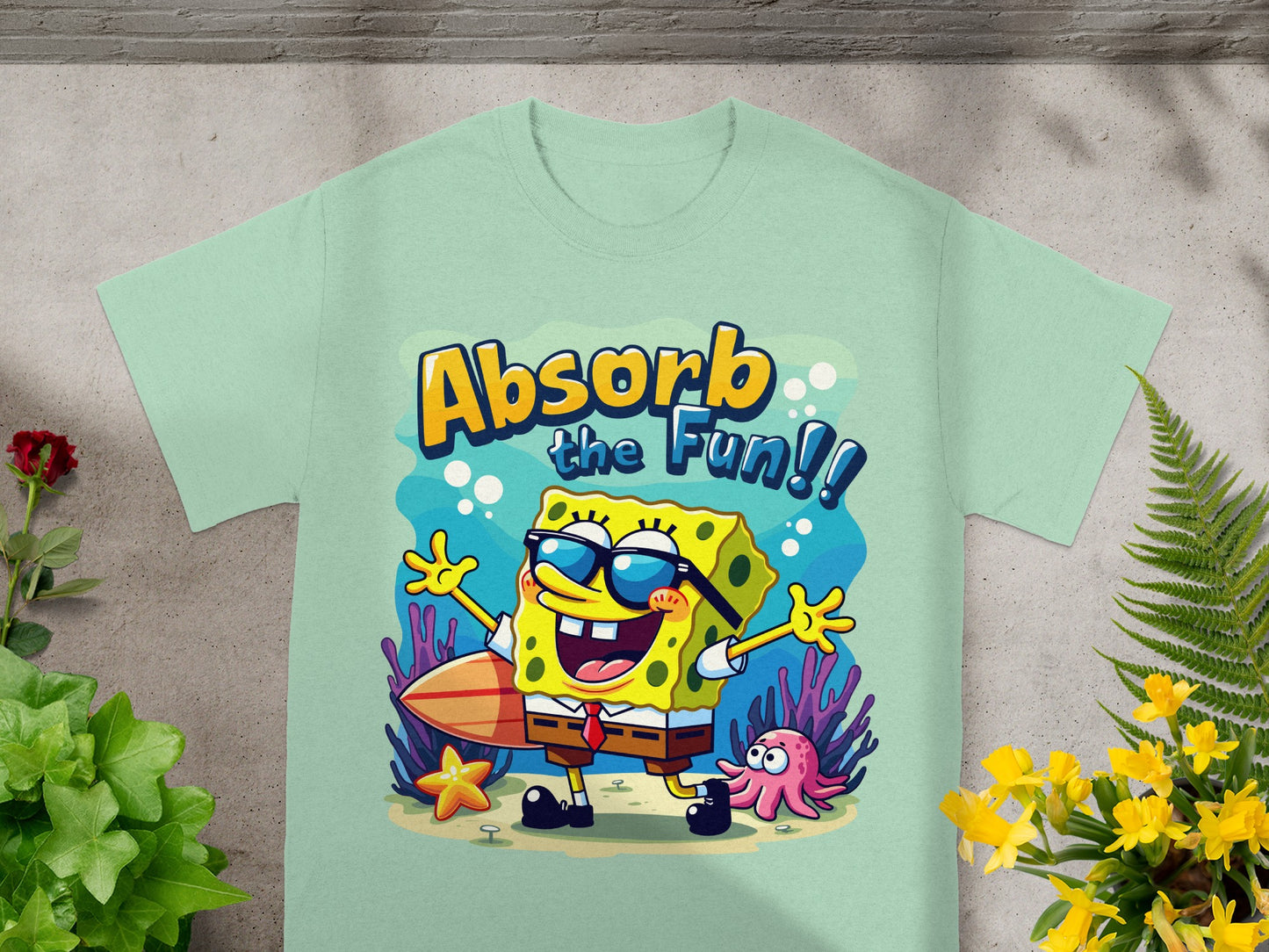 SpongeBob SquarePants on t-shirt with "Absorb the Fun!!" text, surfboard and octopus.