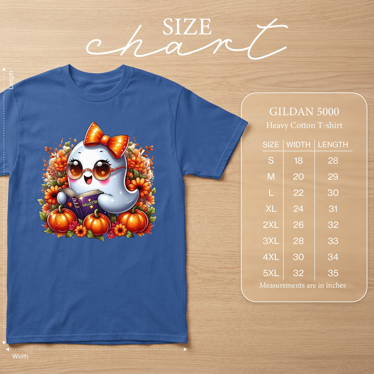 Blue t-shirt with cute ghost reading a book surrounded by pumpkins and flowers. Size chart included.