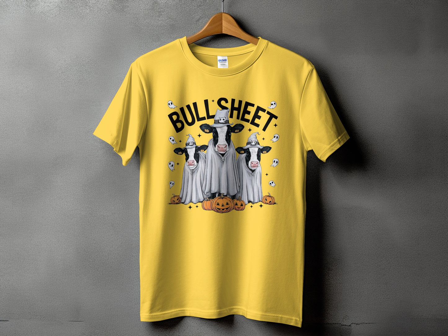 Three cows in ghost costumes with pumpkins and "BULL SHEET" text.