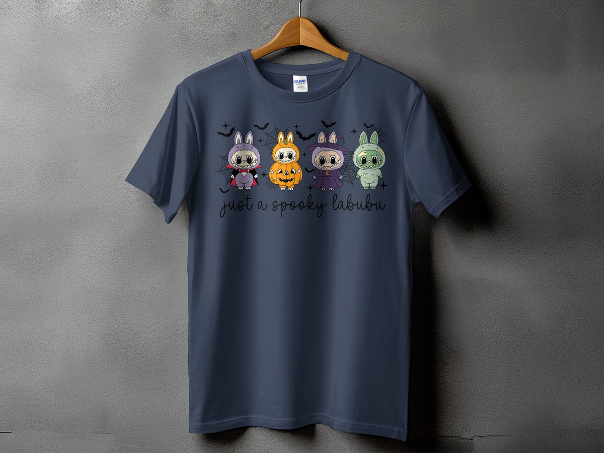 Dark blue t-shirt with four Halloween-themed cartoon characters and text.