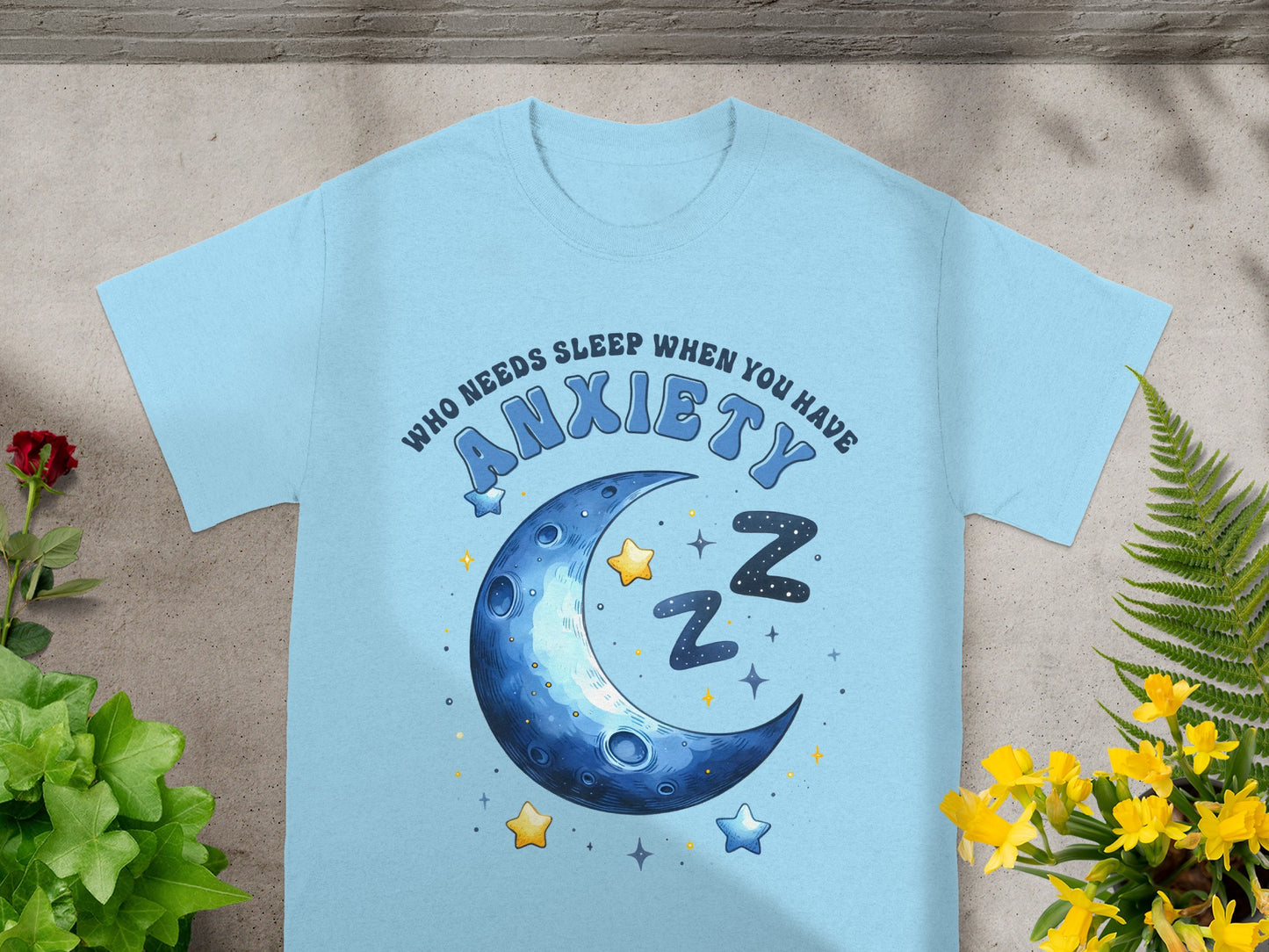 Light blue t-shirt with "Who needs sleep when you have anxiety" and crescent moon graphic.