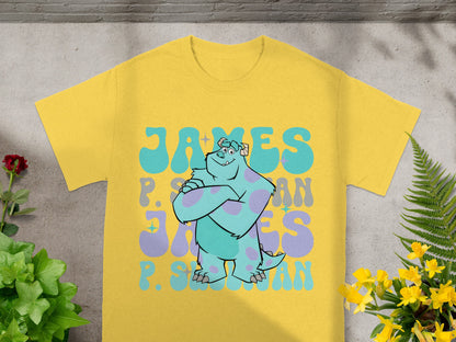 Yellow t-shirt with "James P. Sullivan" in blue and purple lettering.