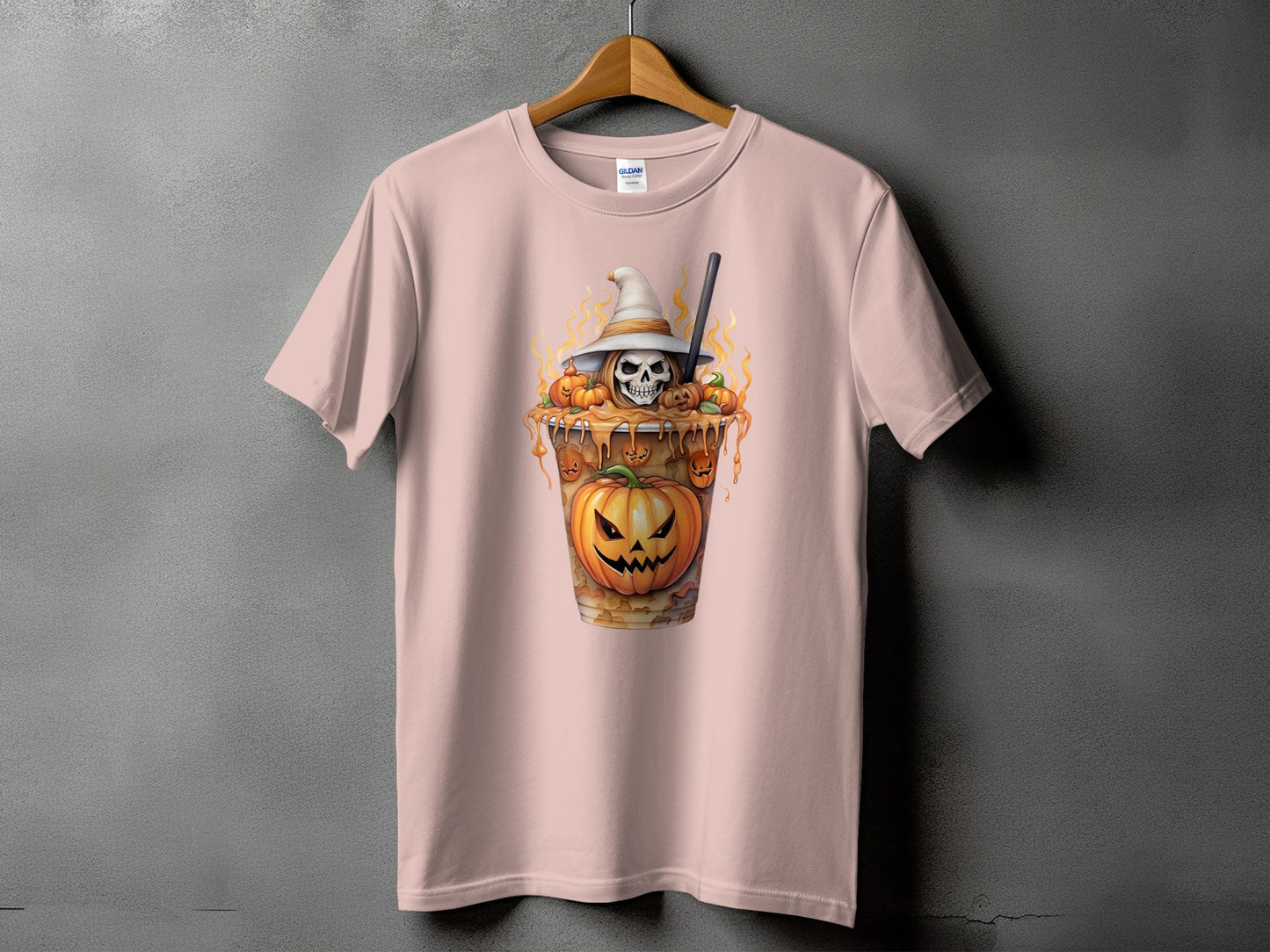 T-shirt with a Halloween-themed graphic of a skull wearing a witch hat and pumpkins.