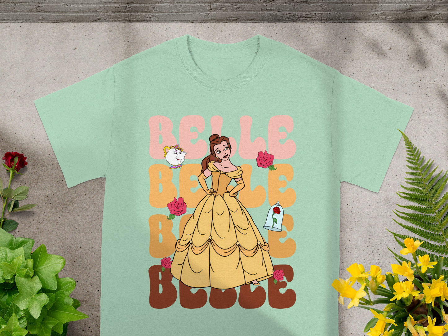 Belle in a yellow gown with roses, "Belle" text.