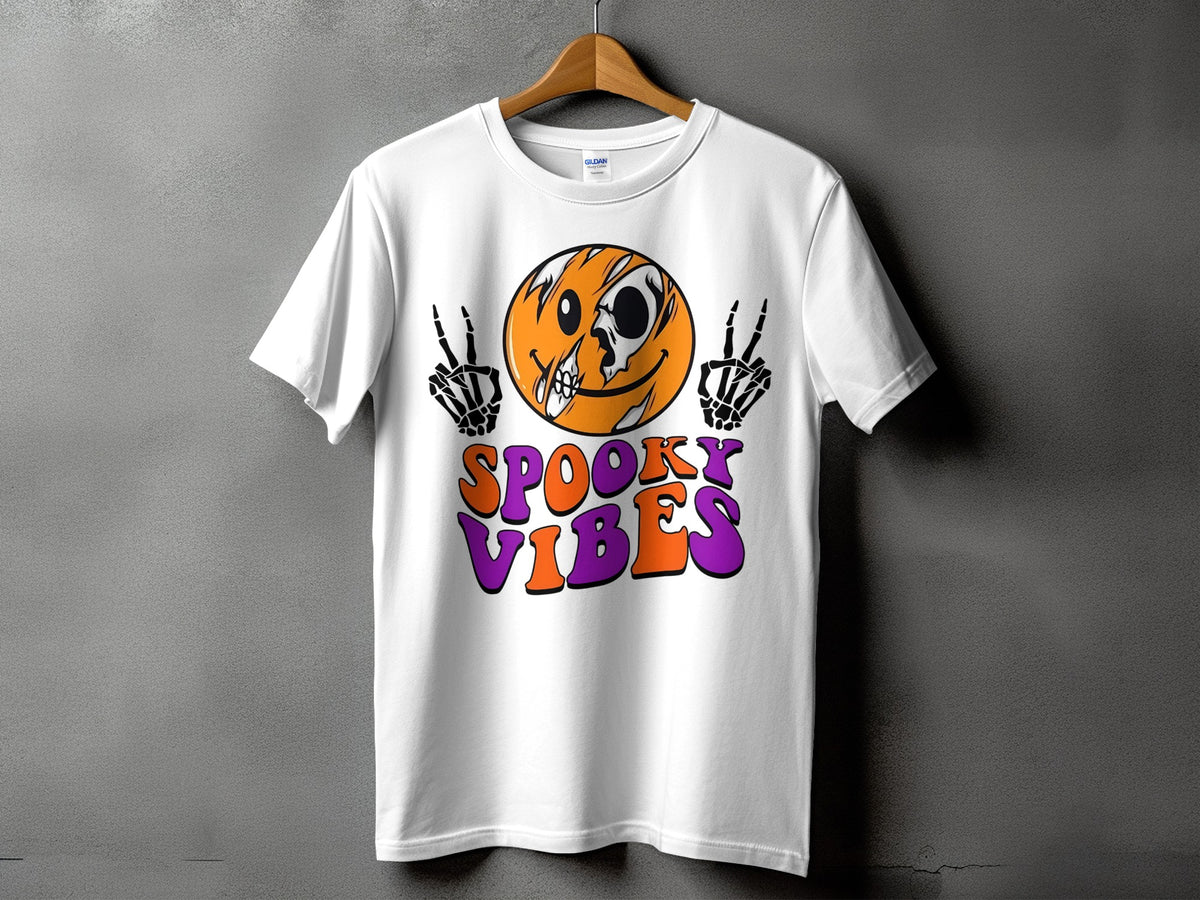 White t-shirt with a cracked smiley face skull and skeleton hands.
