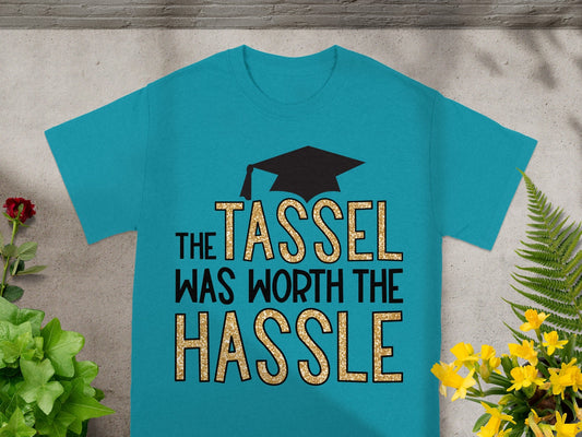Teal t-shirt with "The Tassel Was Worth the Hassle" and graduation cap graphic.