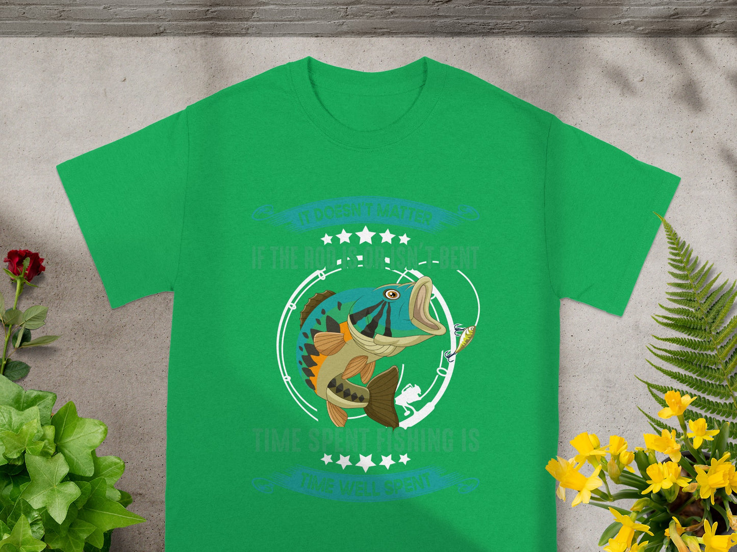 Green t-shirt with fishing graphic: "It doesn't matter if the rod isn't bent. Time spent fishing is time well spent."