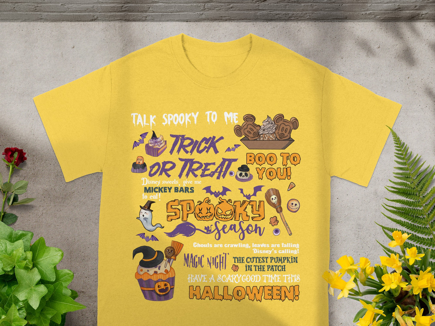 Yellow t-shirt with Halloween graphics and text including "Trick or Treat" and "Spooky Season".