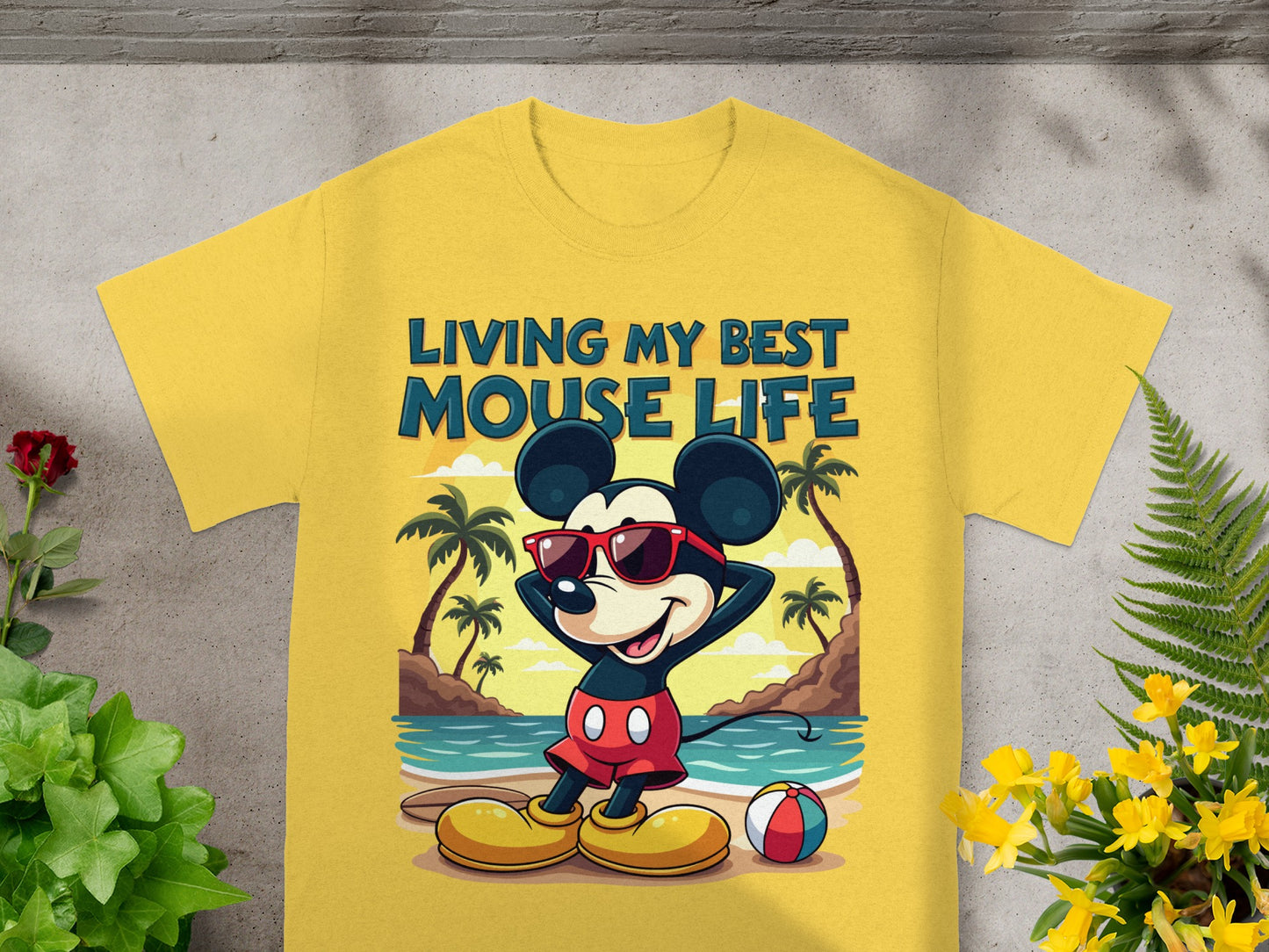 Yellow t-shirt with Mickey Mouse on a beach, text "LIVING MY BEST MOUSE LIFE."