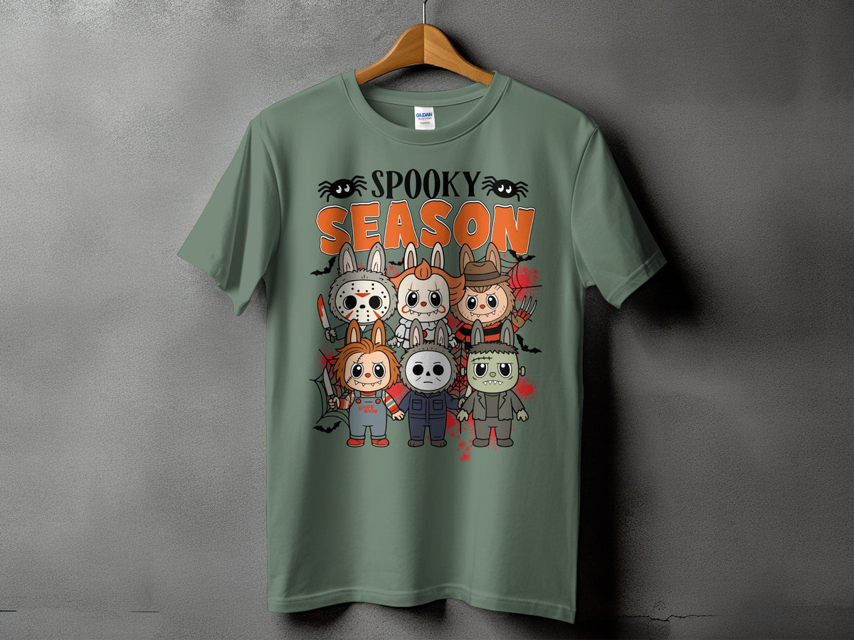 Green t-shirt with "Spooky Season" and cartoon horror characters.
