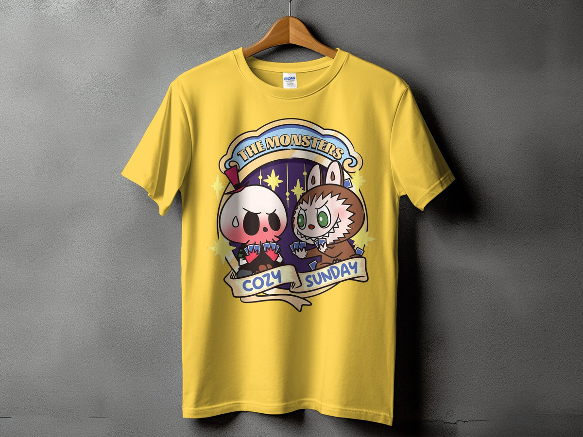 Yellow t-shirt with "The Monsters Cozy Sunday" graphic featuring cartoon monsters.