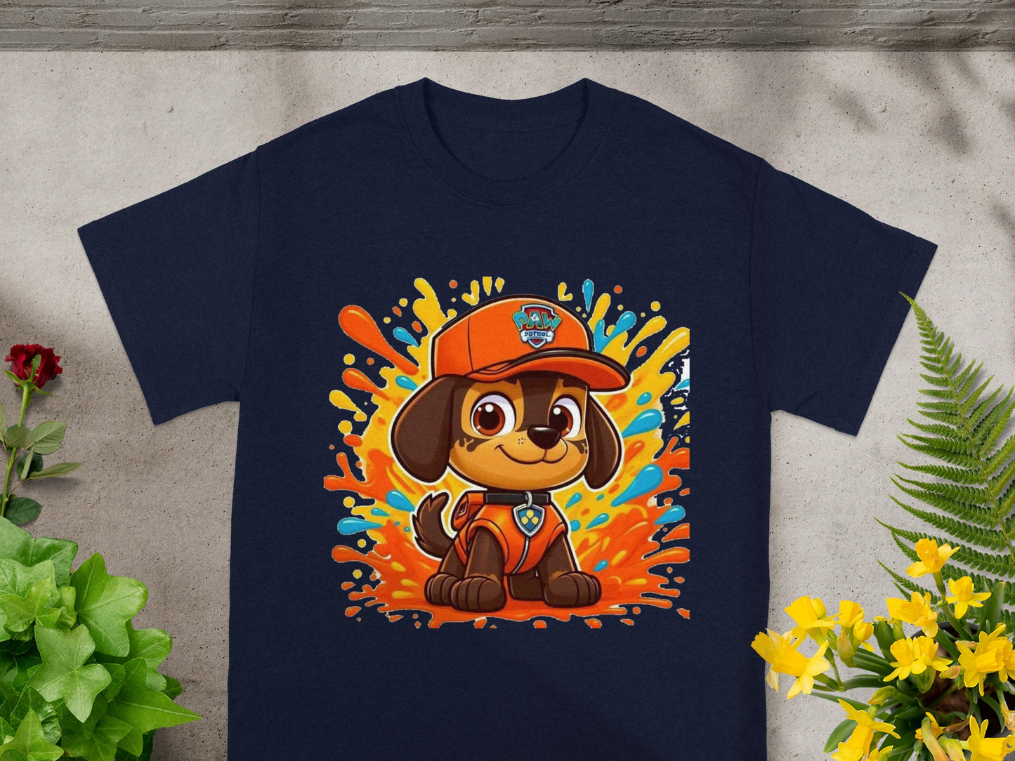Navy t-shirt featuring Chase from Paw Patrol surrounded by colorful splatters.