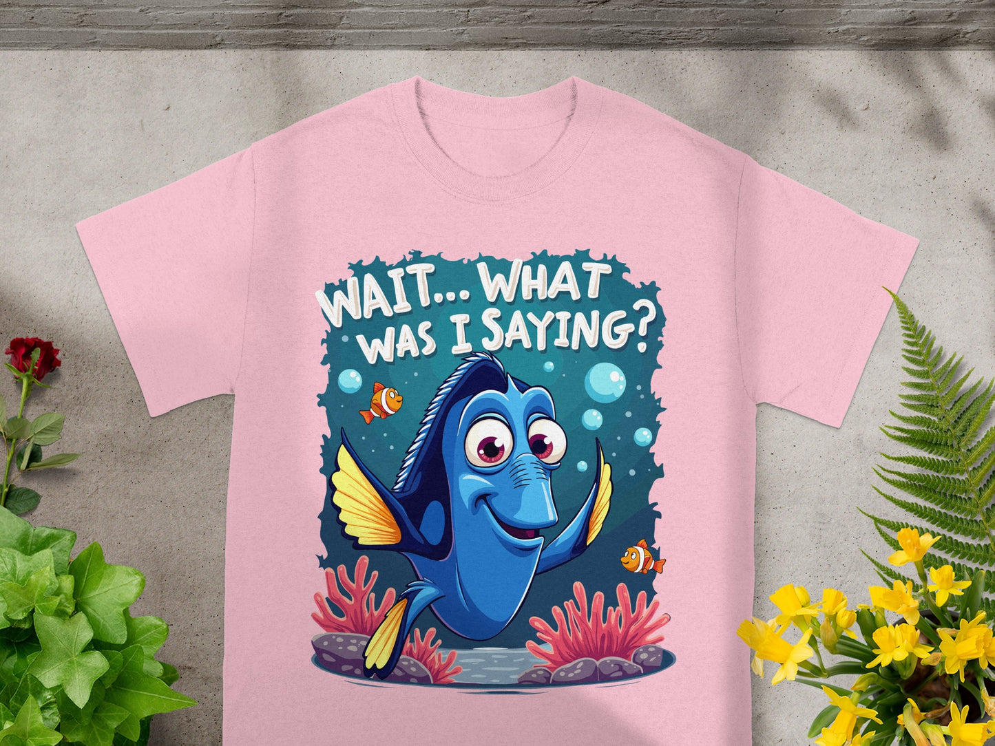 Dory from Finding Nemo on a pink t-shirt saying "Wait...What Was I Saying?".
