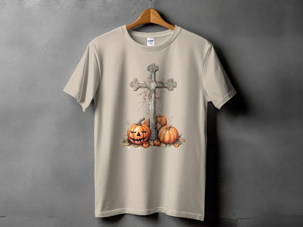 Light tan t-shirt with a Halloween graphic of a cross and pumpkins.