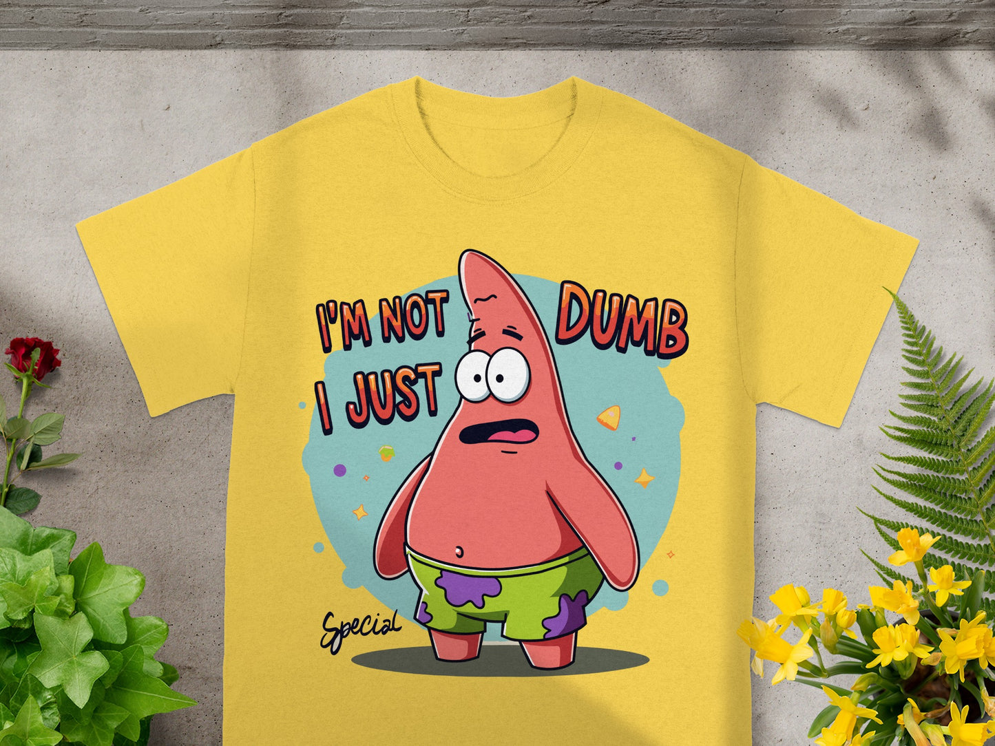 Yellow t-shirt featuring Patrick Star with "I'm not dumb I just..." text.