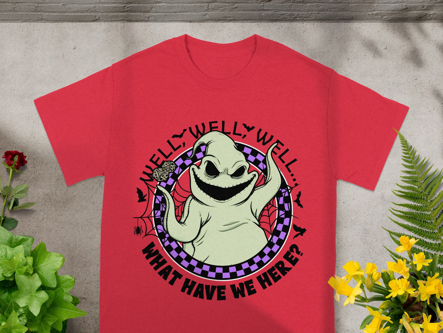 Red t-shirt with Oogie Boogie graphic and text "WELL, WELL, WELL... WHAT HAVE WE HERE?".