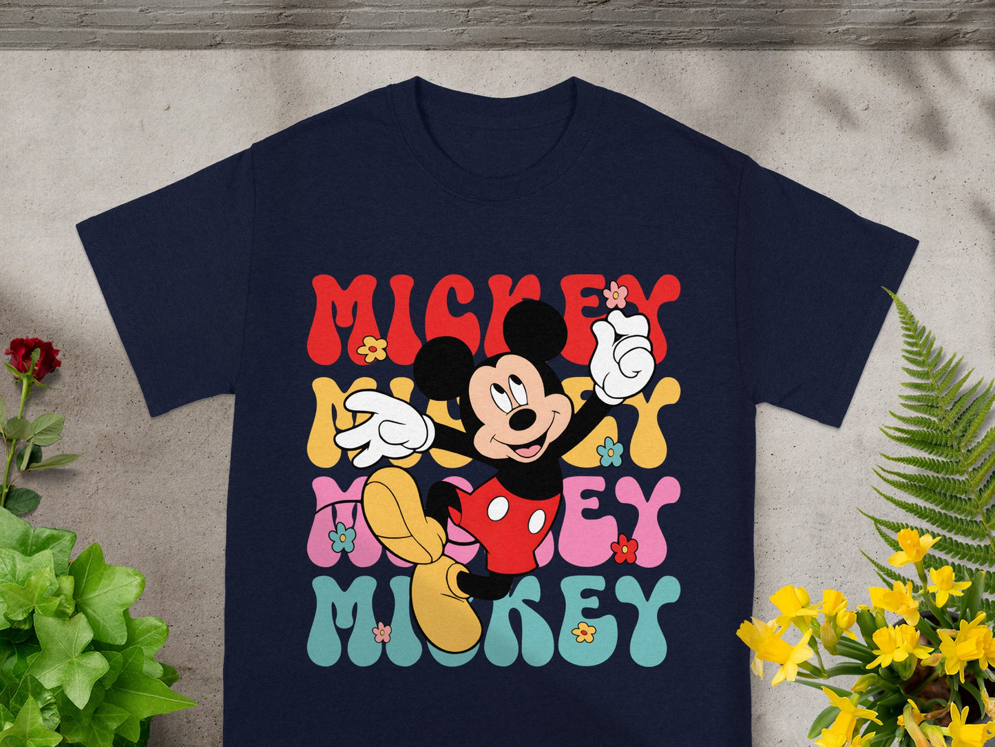 Mickey Mouse graphic t-shirt with colorful groovy text.