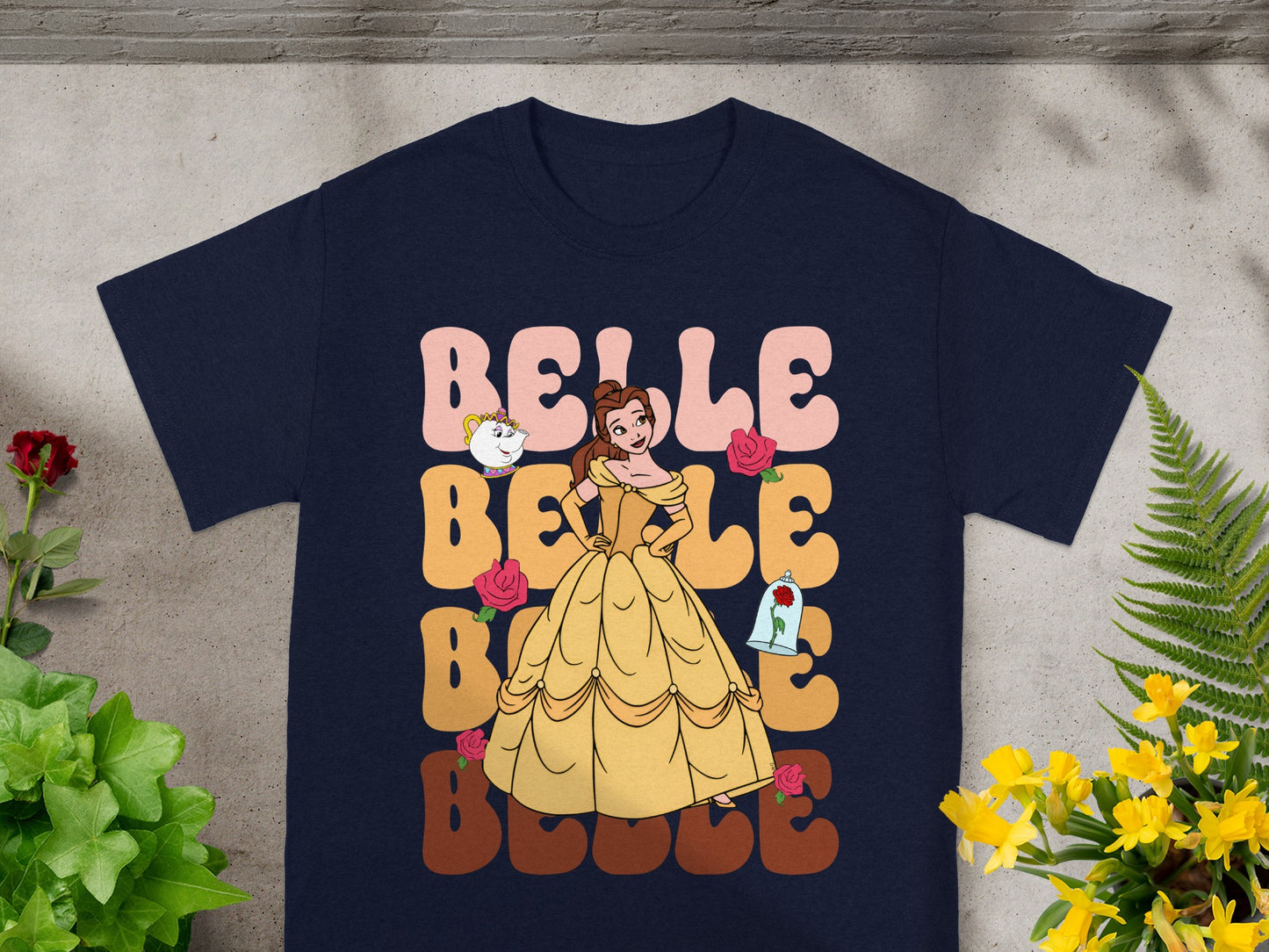 Belle in yellow dress with roses and Chip on navy t-shirt.