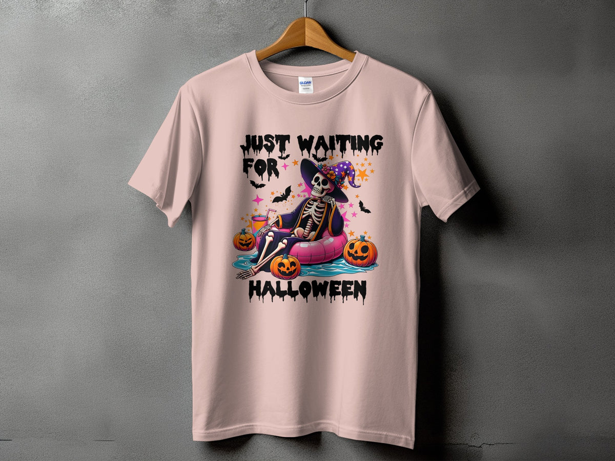 Pink t-shirt with "Just Waiting For Halloween" text and a skeleton graphic.