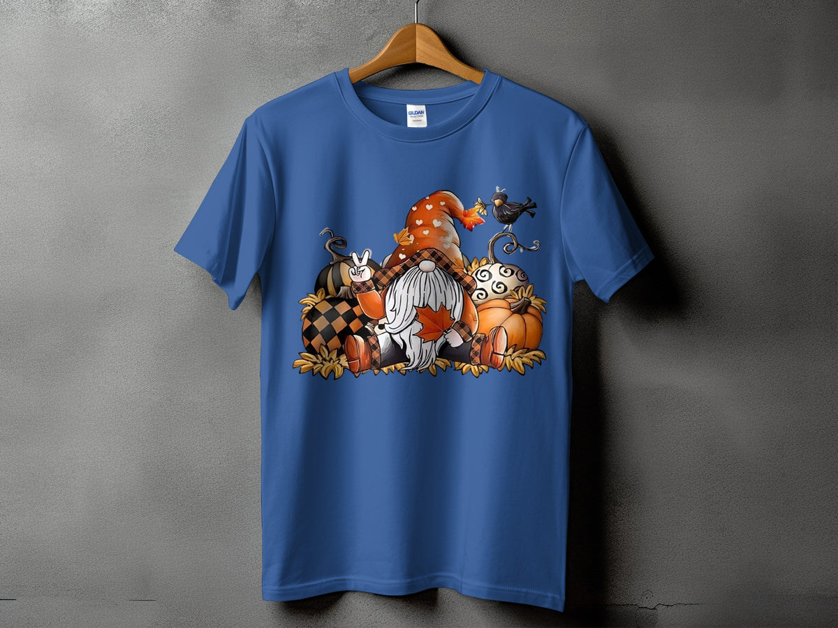 Blue t-shirt with a fall-themed graphic featuring gnomes, pumpkins, and a bird.