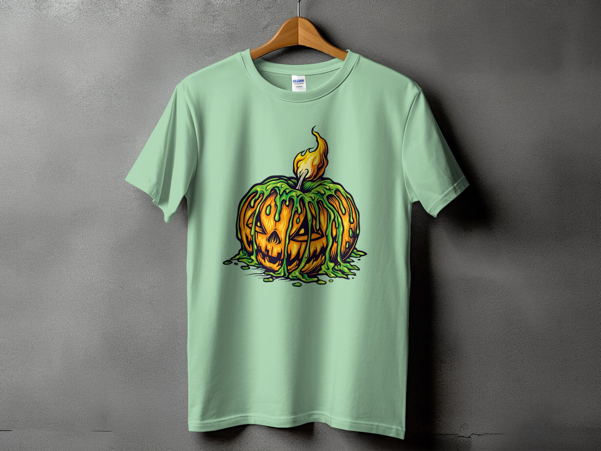 Light mint t-shirt with a melting Jack-o'-lantern and flame graphic.