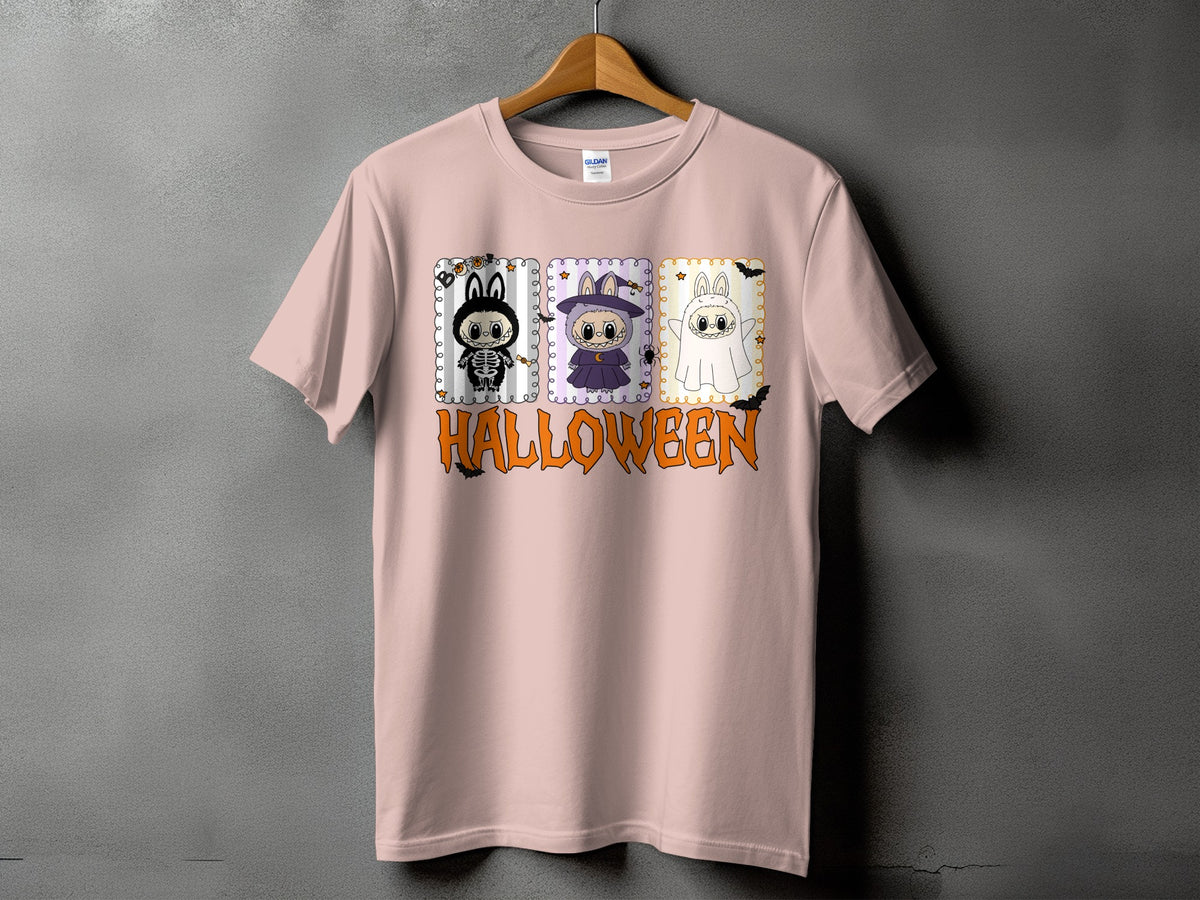 Pink t-shirt with three Halloween cartoon characters and "HALLOWEEN" text.