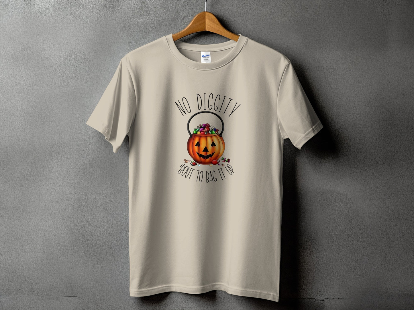 Tan t-shirt with "No Diggity Bout to Bag It Up" and pumpkin candy bucket graphic.