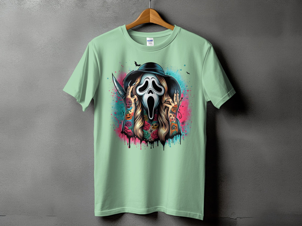 Mint green t-shirt with a Ghostface mask graphic and colorful spray paint drips.
