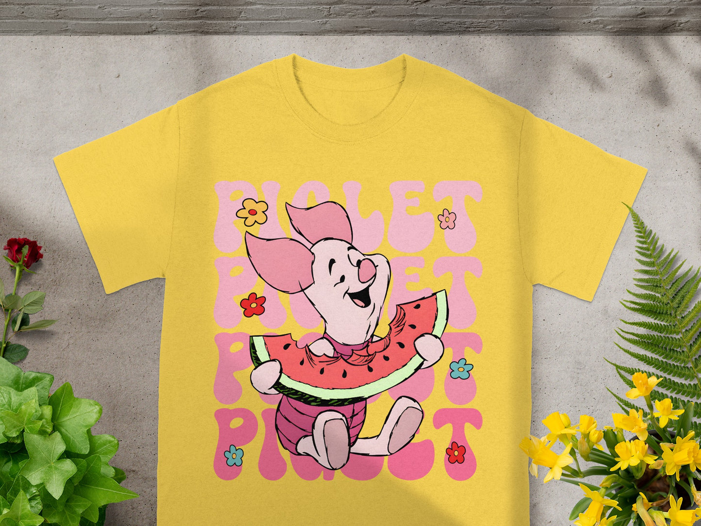 Piglet eating watermelon on a yellow t-shirt with "Violet Pink" text.