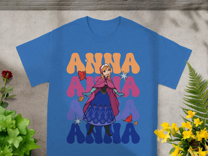 Blue t-shirt with Anna from Frozen character graphic and colorful text.