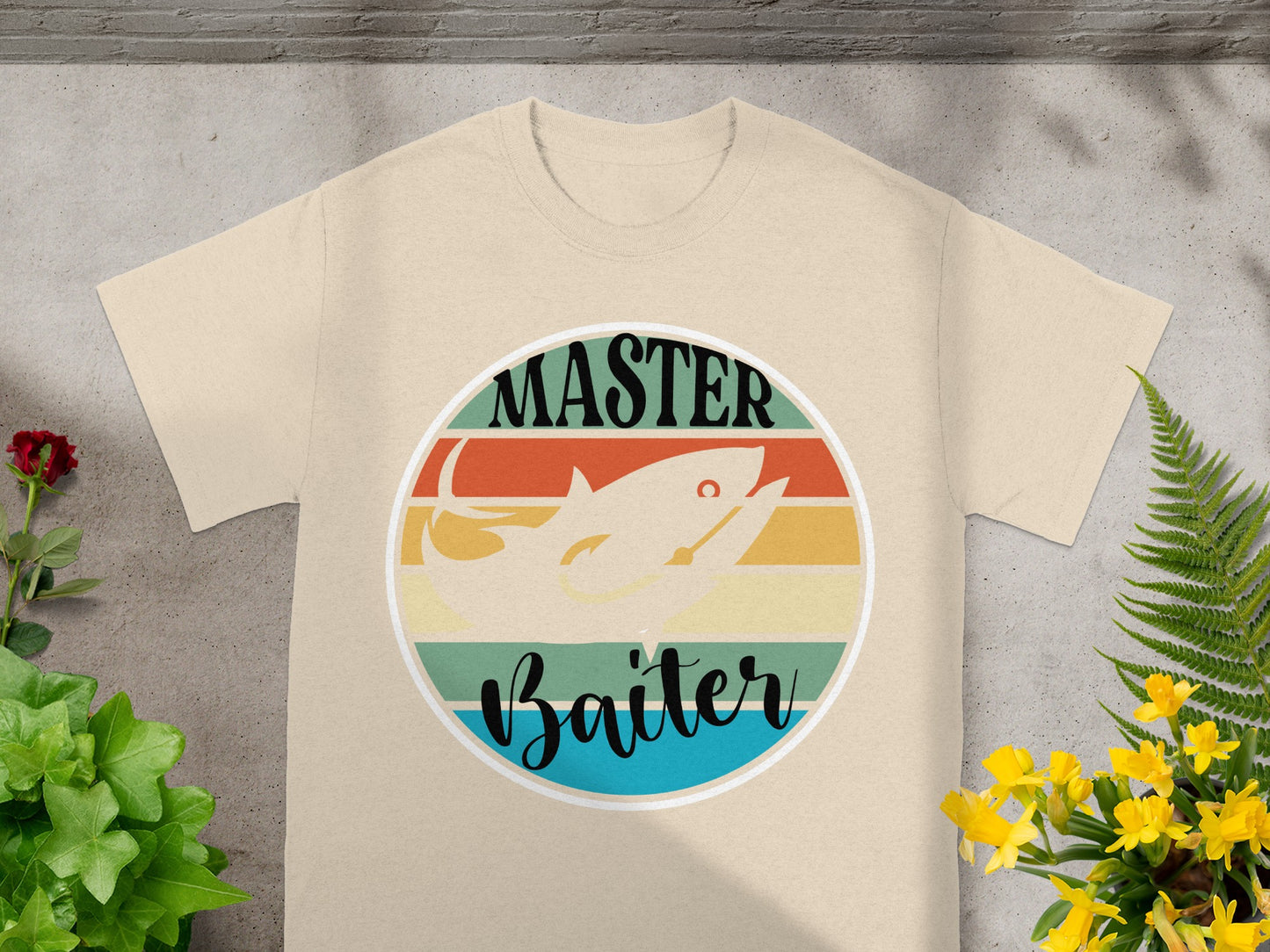 Cream t-shirt with "Master Baiter" fishing graphic in a circular vintage design.