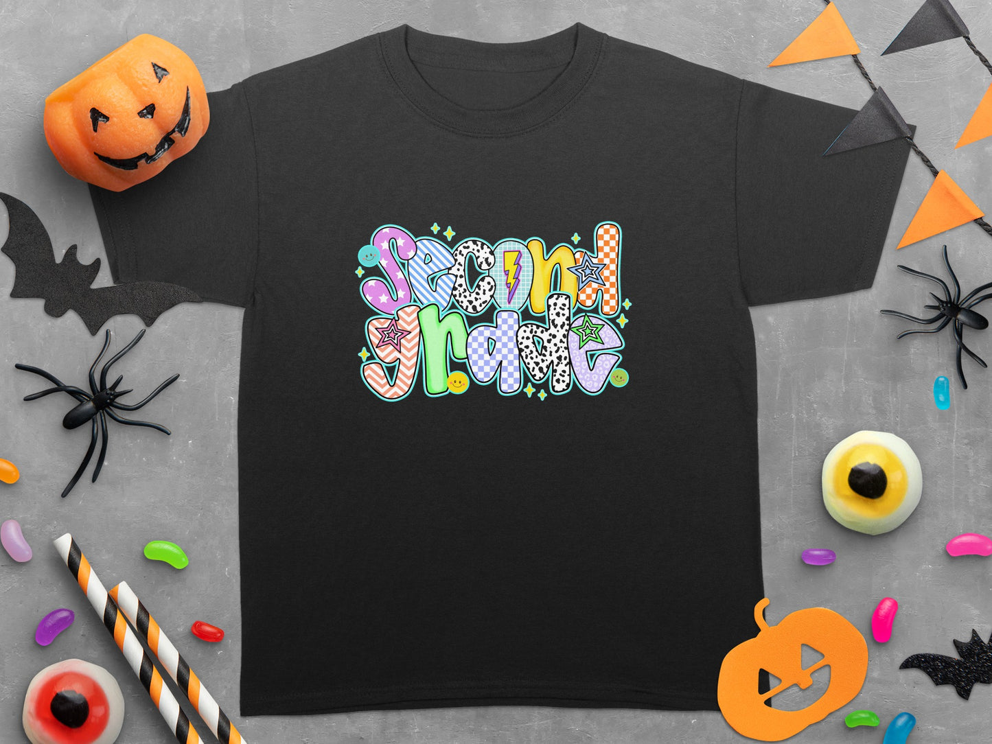 Black t-shirt with "Second Grade" in colorful, patterned wavy font.