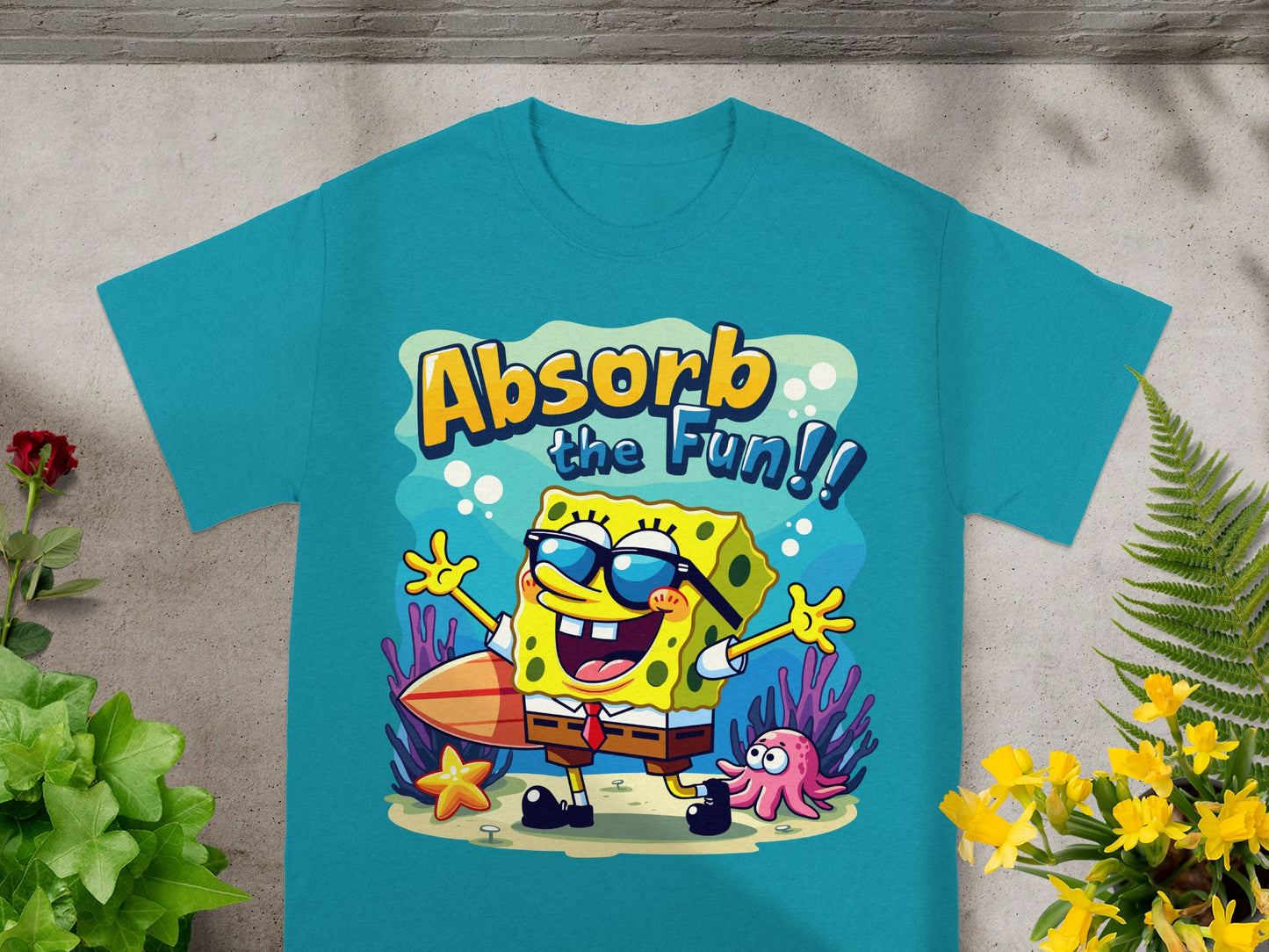 SpongeBob SquarePants in sunglasses with surfboard and text "Absorb the Fun!!".