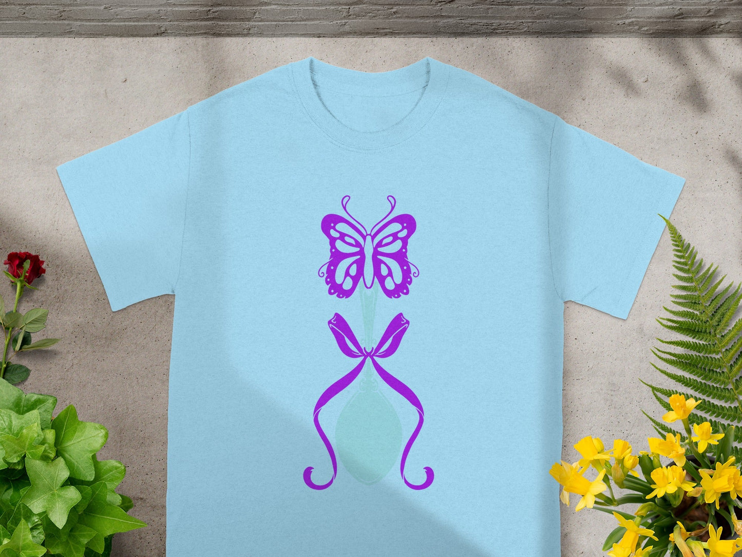 Butterfly and Bow Design on Light Blue T-shirt