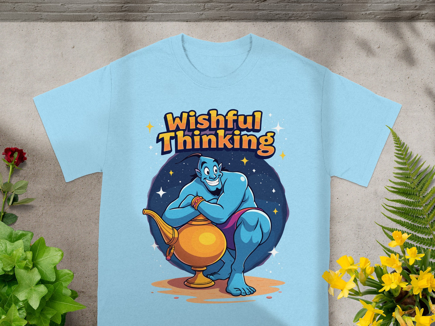Blue genie with lamp text "Wishful Thinking" on a light blue t-shirt.