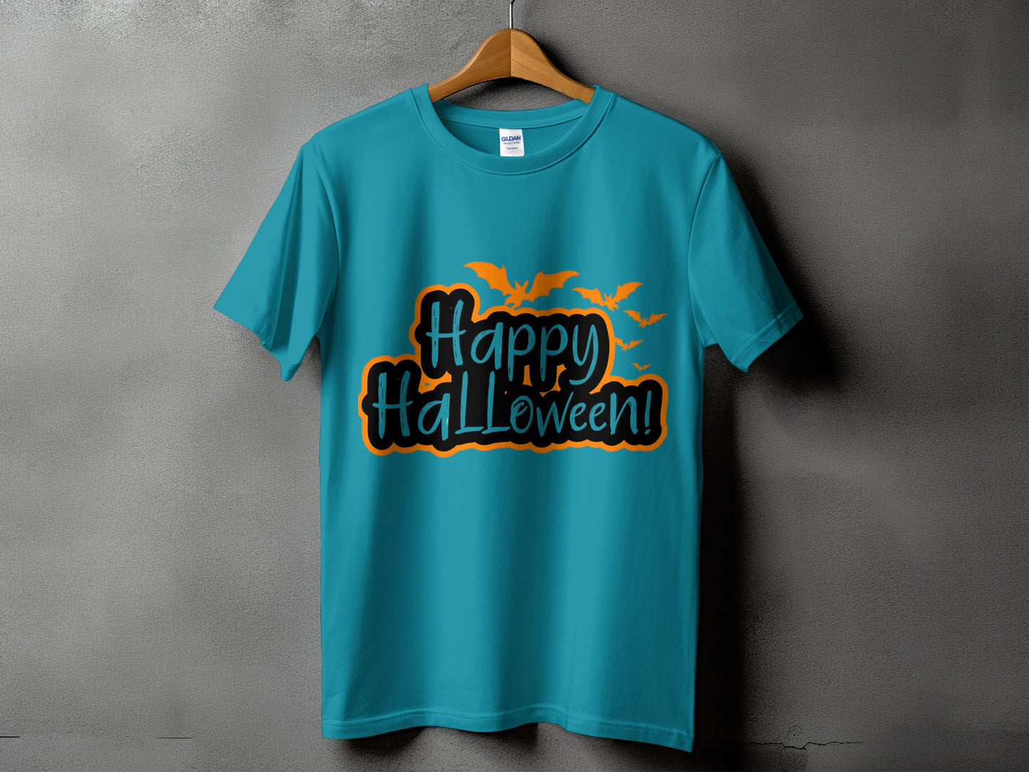 Teal t-shirt with "Happy Halloween!" text and orange bats design.