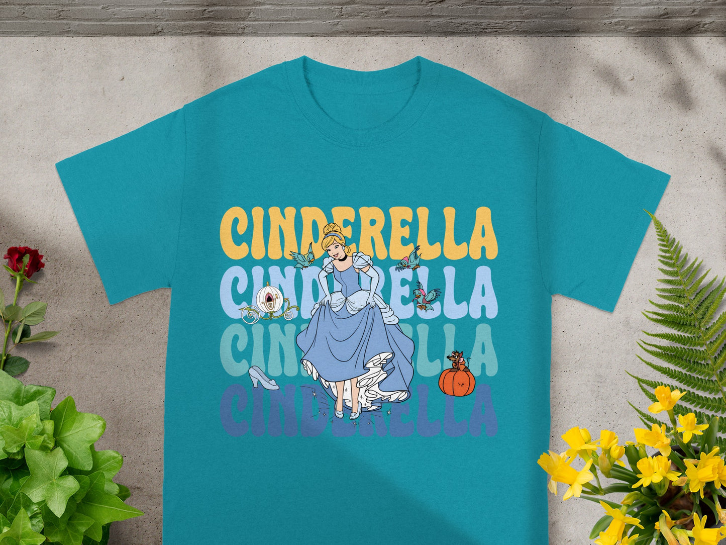 Cinderella t-shirt with a character illustration and colorful text.