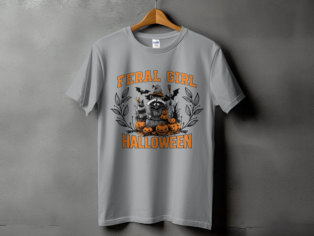 Grey t-shirt with Halloween raccoon and pumpkins graphic, "FERAL GIRL HALLOWEEN" text.