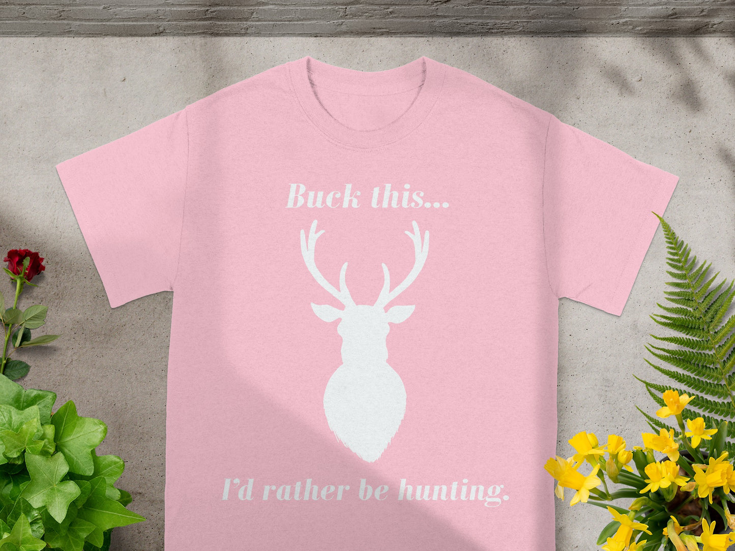 Pink t-shirt with white text "Buck this..." and deer silhouette, "I'd rather be hunting."