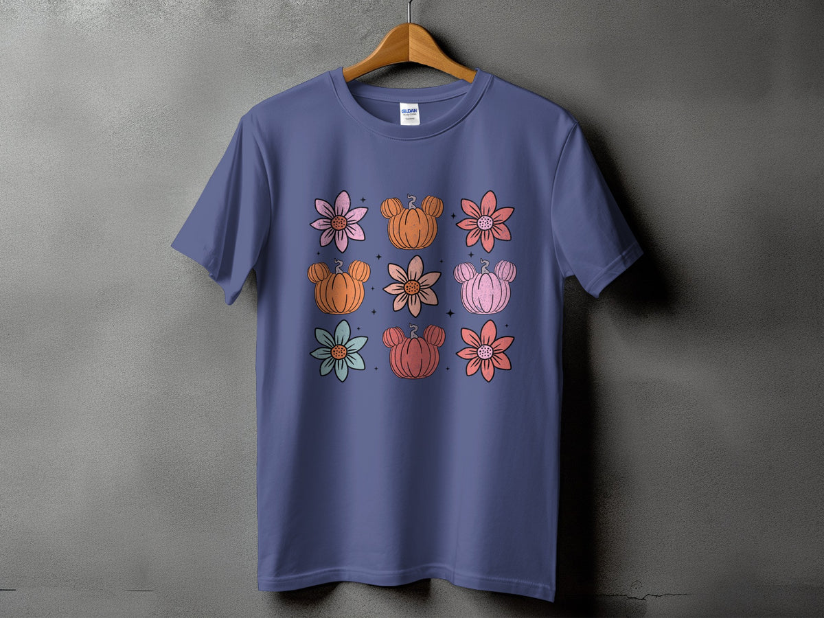 Purple t-shirt with a nine-panel floral and pumpkin design.