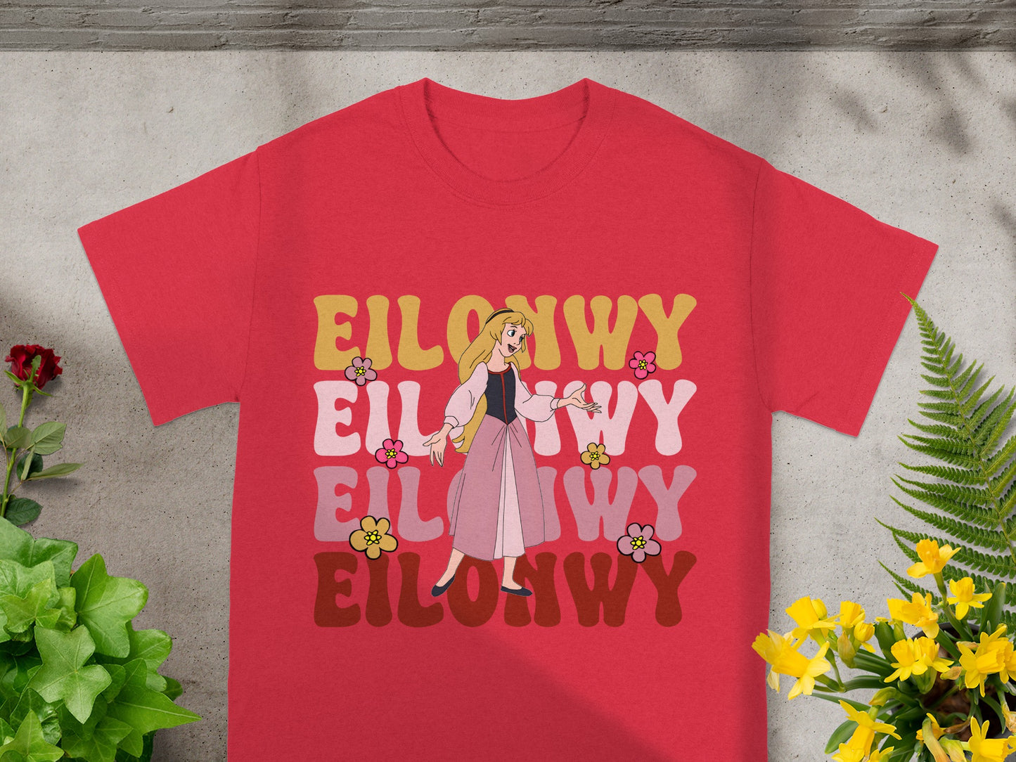 Red t-shirt with "EILOWWY" in colorful retro lettering and a floral graphic.