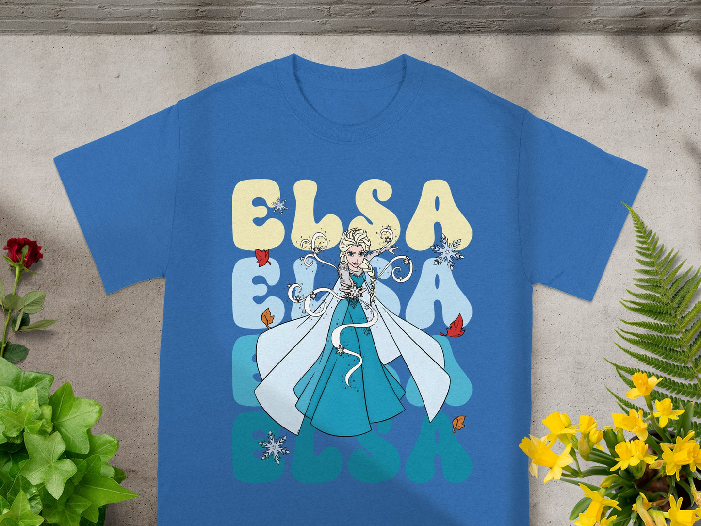Blue t-shirt with Elsa from Frozen and the text "Elsa Elsa"