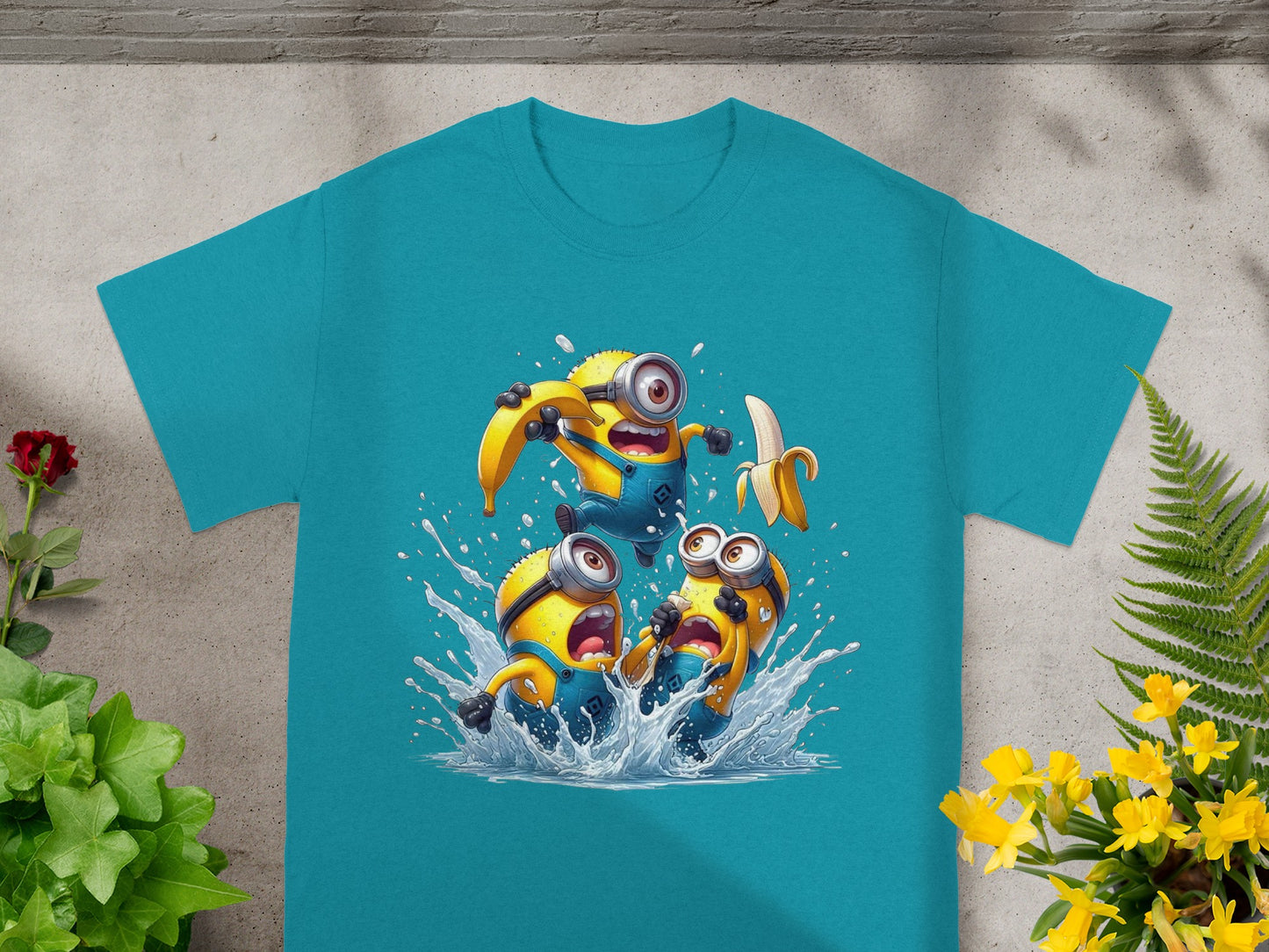 Three Minions splashing in water, one holding a banana.