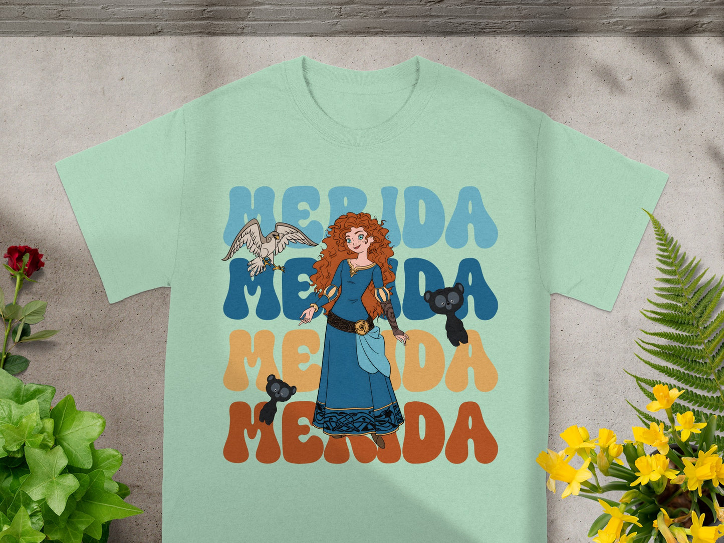 Merida from Brave with blue and orange text, framed by plants.