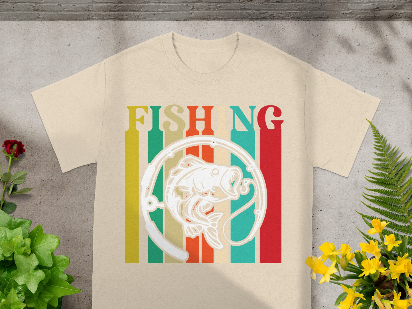 Cream t-shirt with vertical stripes and white fishing graphic and text.